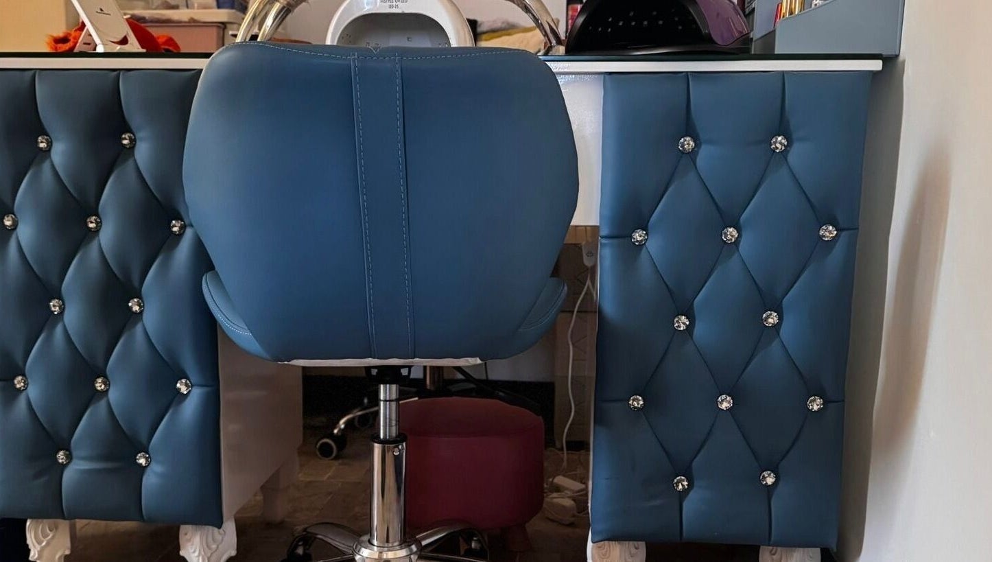 Lux Beauty Studio x Nae in Holetown, Saint James, BB features a plush blue styling chair with crystal accents.