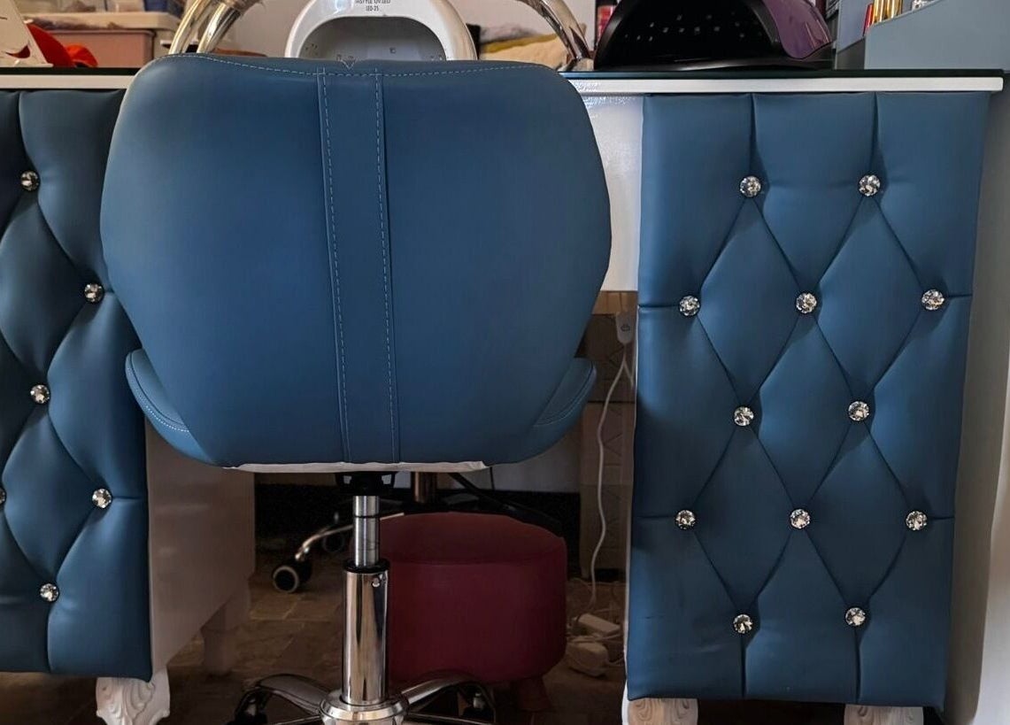Lux Beauty Studio x Nae in Holetown, Saint James, BB features a plush blue styling chair with crystal accents.