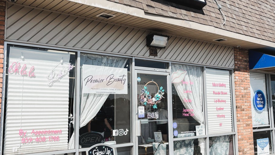 Exterior of Premier Beauty in Berea, Kentucky, US showcasing inviting entrance and stylish signage.