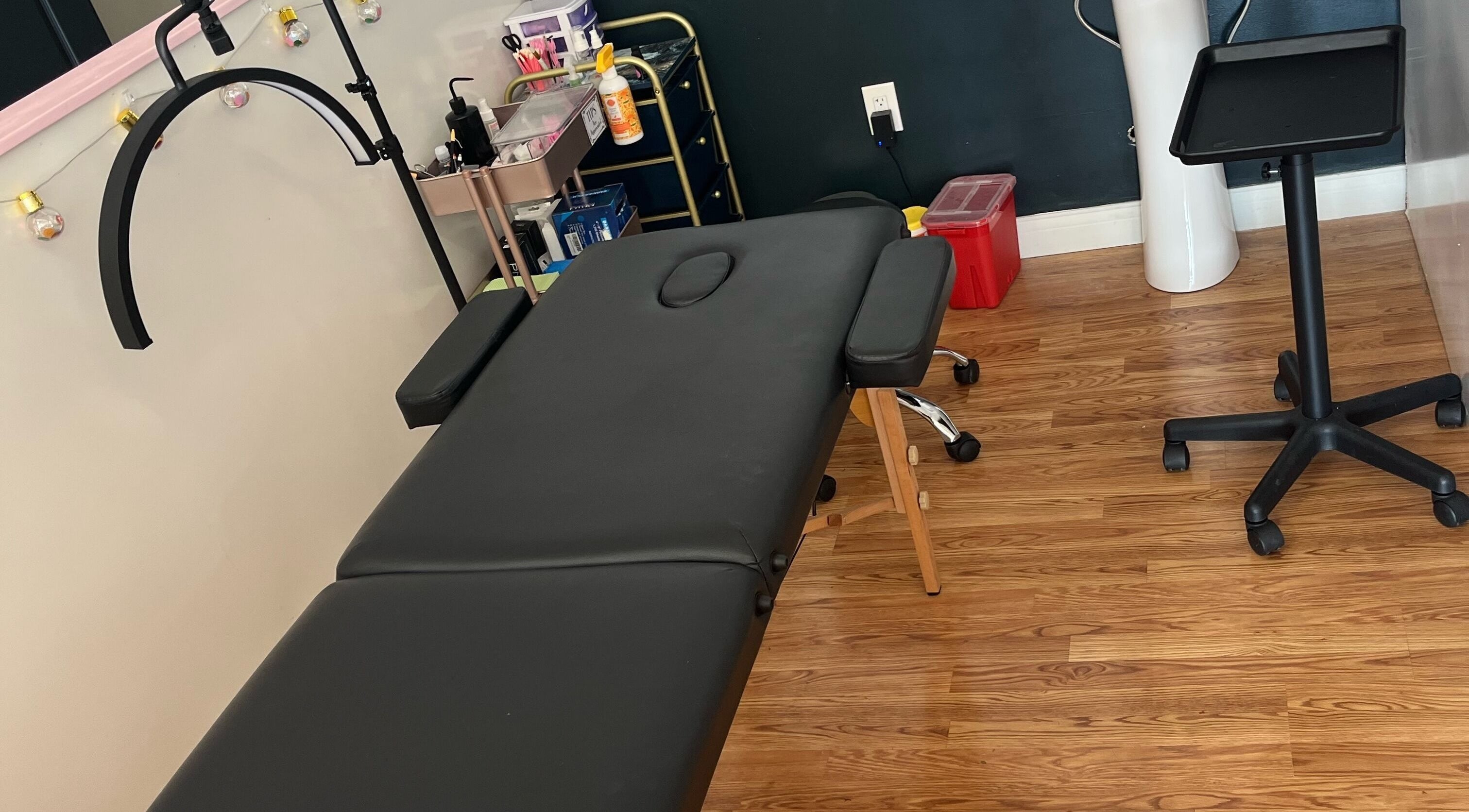 Relaxing treatment room at Premier Beauty in Berea. Modern decor and cozy massage table in Berea, Kentucky, US.