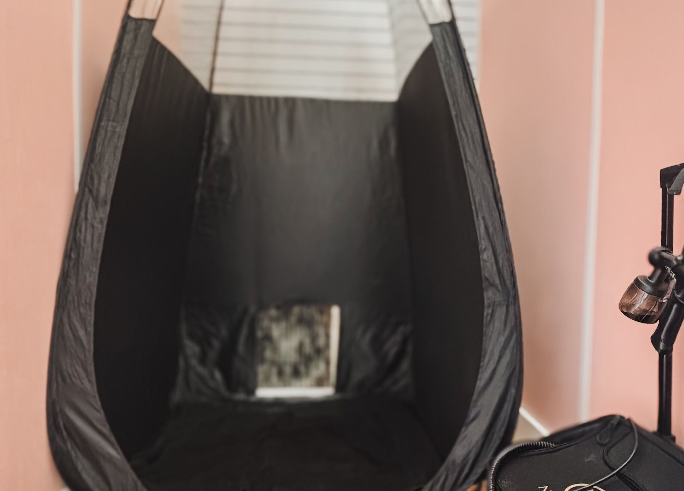 Spray tan booth at Premier Beauty in Berea, Kentucky, US for perfect sunless tanning experience.