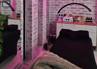 Relaxing treatment room at Lyndal's - Lash Brow & Beauty in Cape Town, Western Cape, ZA with ambient lighting.