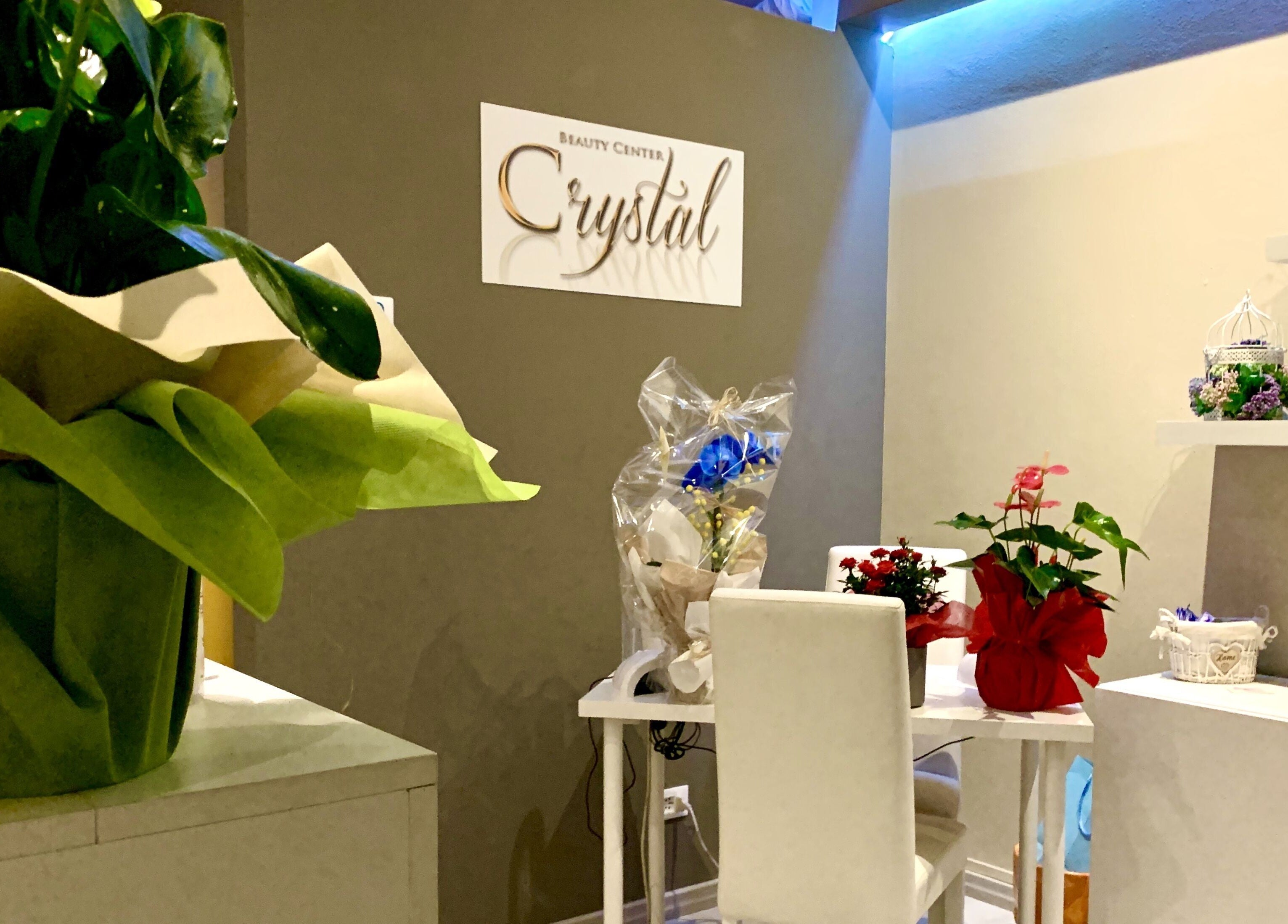 Elegante angolo di Crystal Estetica - Pomezia (RM) con decorazioni verdi a Pomezia, Lazio, IT.