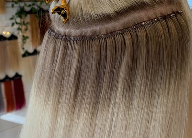 Close-up of hair extensions at Loxy Locks Hair Extensions, Belper, England, GB showcasing expert blending.