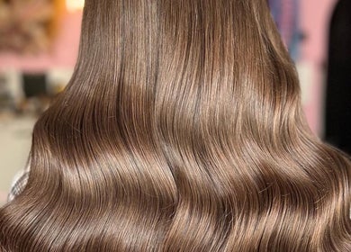 Smooth, wavy hair extensions at Loxy Locks Hair Extensions, Belper, England, GB. Elegant and glossy finish.