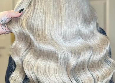 Luxurious blonde hair extensions styled at Loxy Locks Hair Extensions, Belper, England, GB.