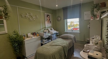 Calming treatment room at Timeless Beauty by Liz Foran in Paisley, Scotland, GB, featuring cozy ambiance.