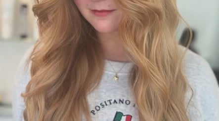 Blonde waves styled at Kerry Miller Hair, Cove Bay, Scotland, GB, showcasing salon's expertise in hair design.