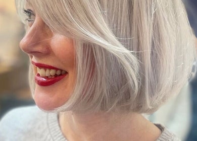 Stylish platinum bob hairstyle at Kerry Miller Hair, Cove Bay, Scotland, GB, showcasing skilled craftsmanship.