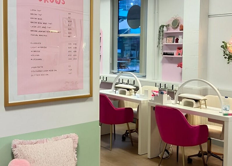 Modern interior of The Beauty Bar Bristol at Stoke Gifford, England, GB with stylish decor and nail stations.