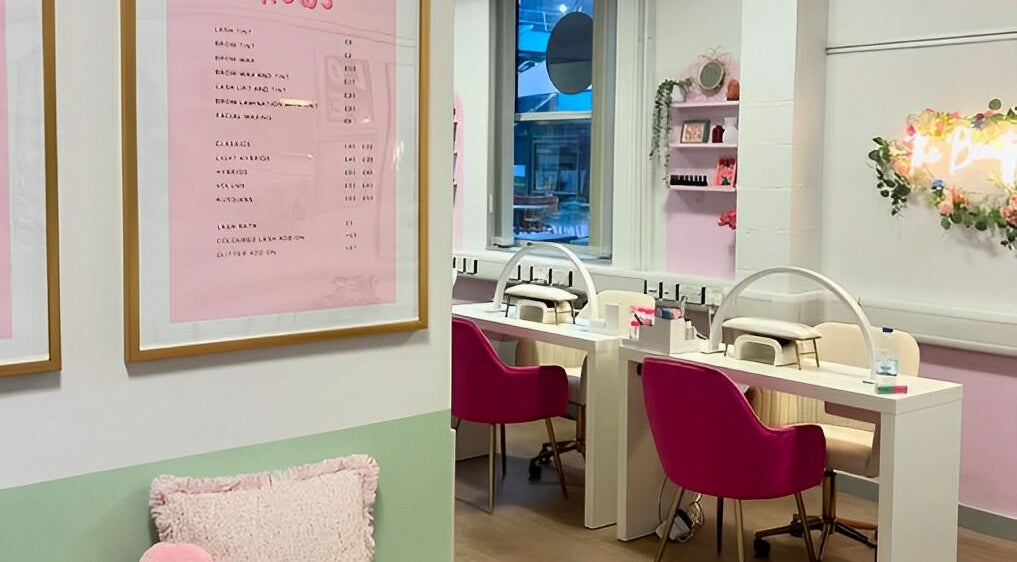 Modern interior of The Beauty Bar Bristol at Stoke Gifford, England, GB with stylish decor and nail stations.