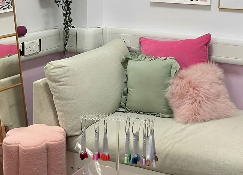 Chic and cozy seating area in The Beauty Bar Bristol, Stoke Gifford, England, GB with pastel decor.