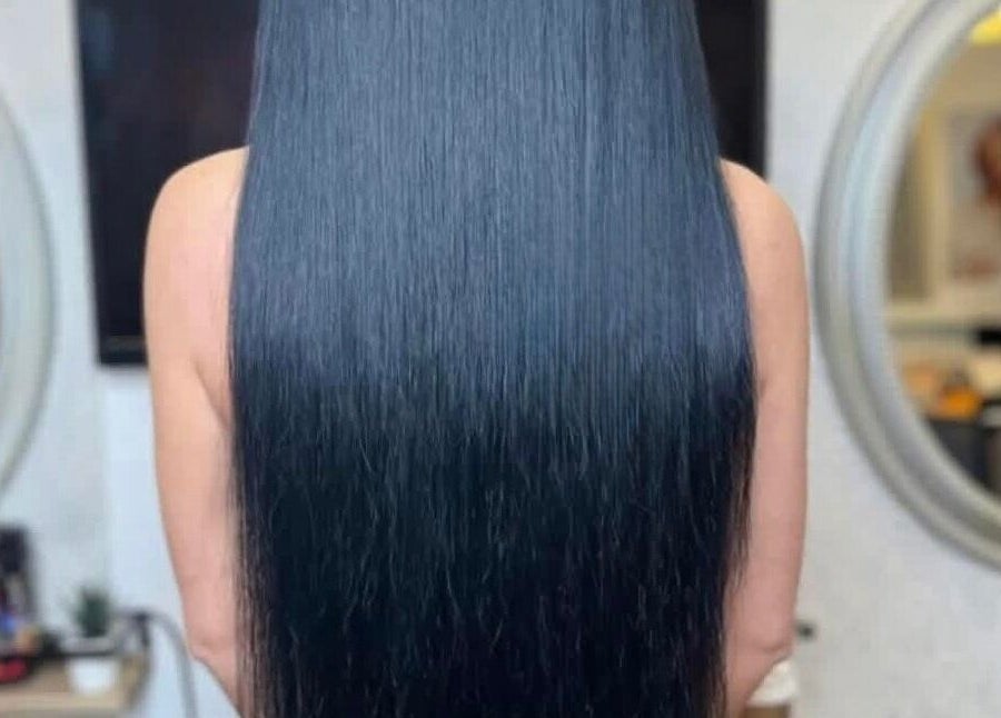 Extensions de cheveux longs et lisses à Vivi Extension, Mirabel, Québec, CA, reflétant soin et beauté.