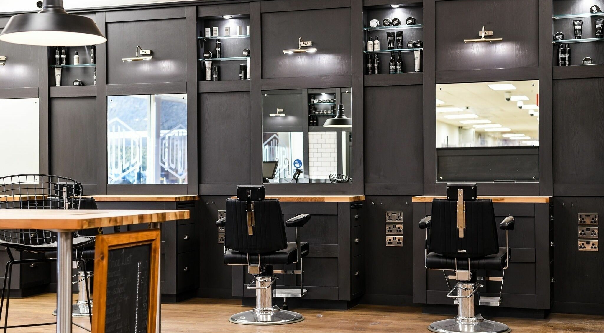 Modern styling stations at Gould Barbers Mansfield, Mansfield, England, GB, featuring sleek design and professional setup.