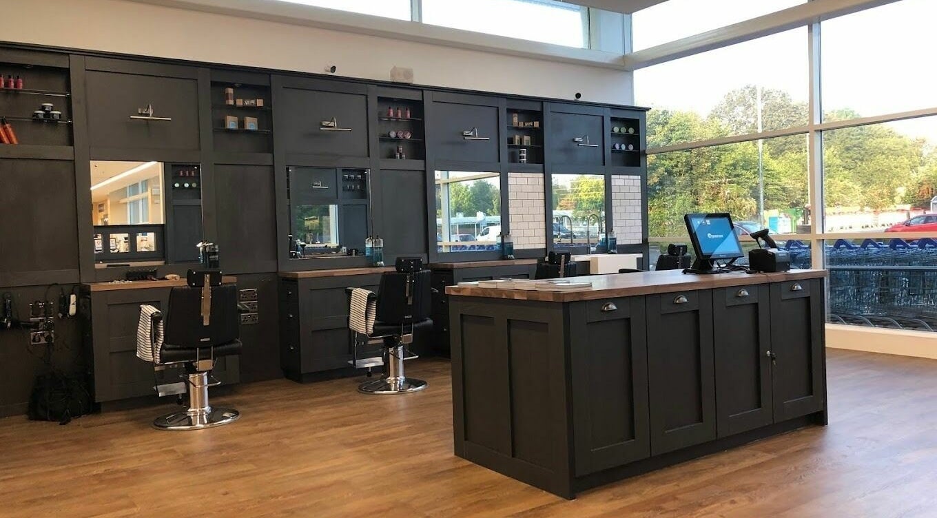 Interior of Gould Barbers Mansfield showcasing sleek design in Mansfield, England, GB with modern barber stations.