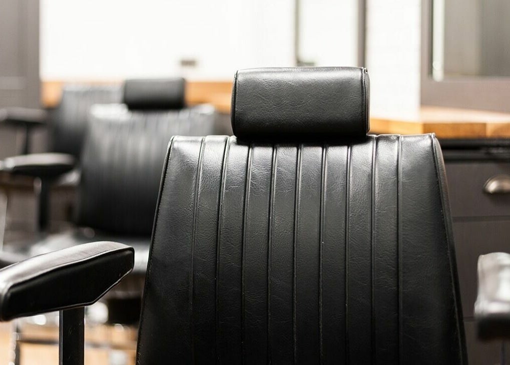 Elegant barber chairs at Gould Barbers Stratford-Upon-Avon, Stratford-upon-Avon, England, GB.
