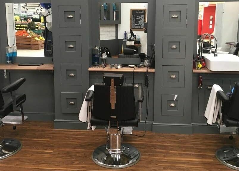 Barber chairs and stylish interior at Gould Barbers Basildon (Mayflower), Basildon, England, GB.