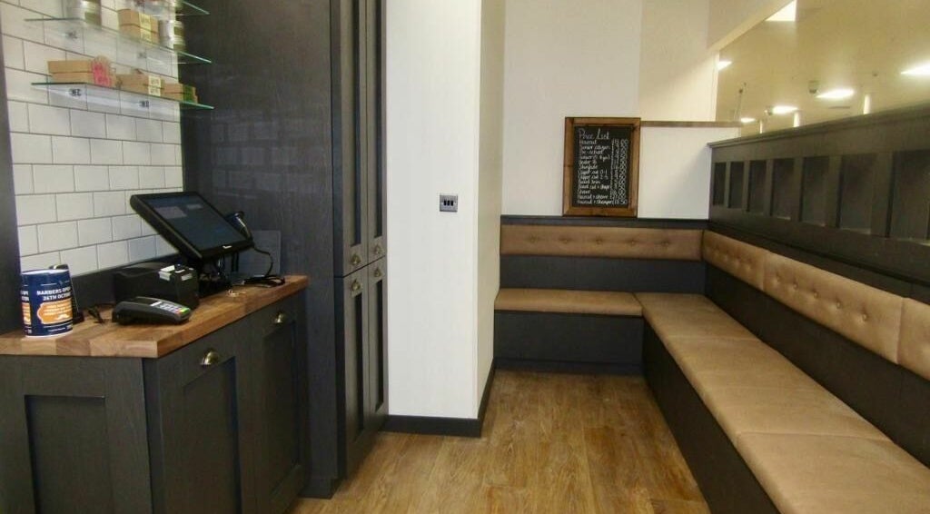 Cozy seating and stylish decor at Gould Barbers Hatfield in Hatfield, England, GB.