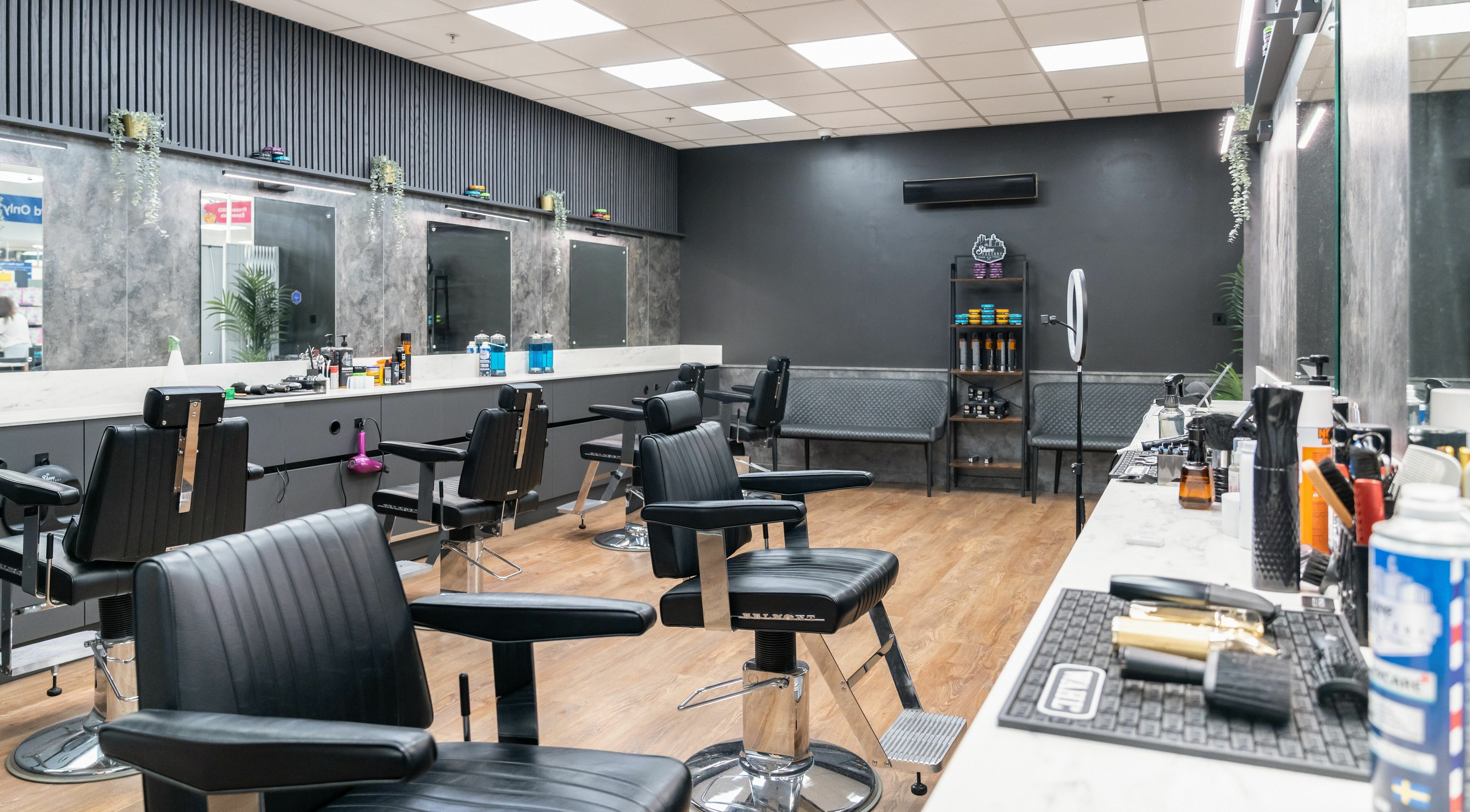 Modern interior of Gould Barbers Bristol, featuring sleek chairs and stylish decor in Bristol, England, GB.