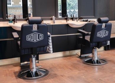 Modern barber chairs at Gould Barbers London (London Bridge), located in London, England, GB.