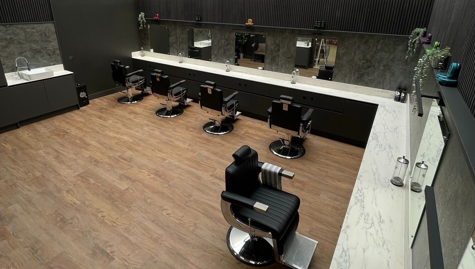 Modern barber chairs at Gould Barbers West Bromwich, West Bromwich, England, GB.