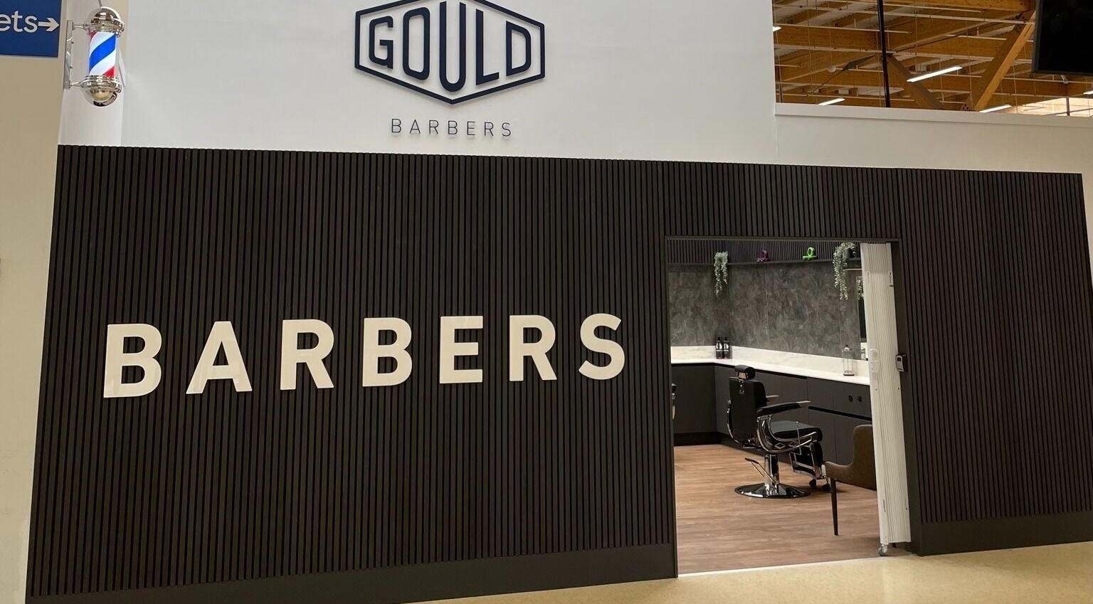 Front view of Gould Barbers West Bromwich in West Bromwich, England, GB showcasing sleek design and inviting entrance.