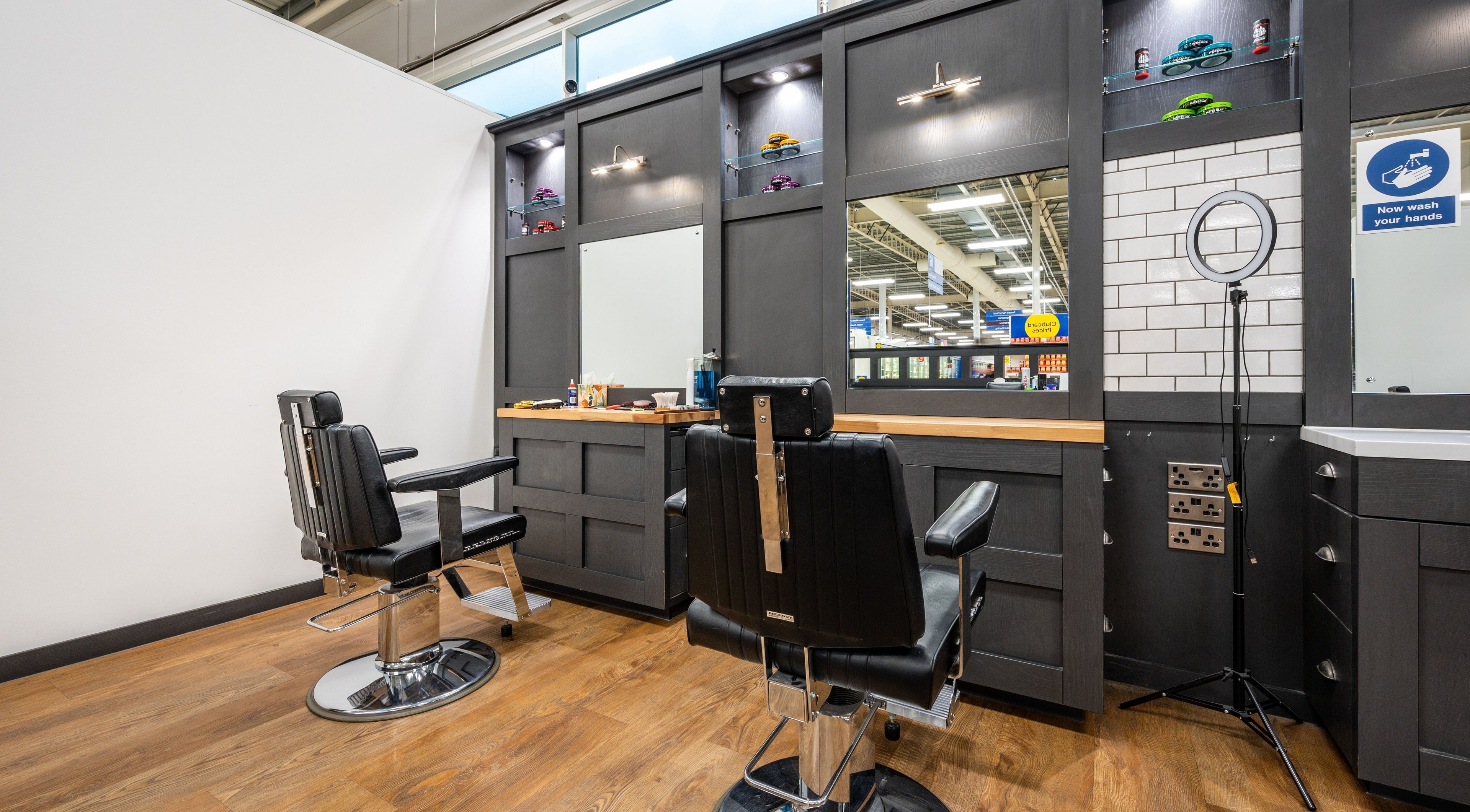 Modern barber chairs at Gould Barbers Bolton (Horwich), Horwich, England, GB offering premium grooming services.