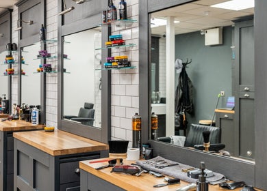 Gould Barbers Cheshunt styling stations with tools in Cheshunt, England, GB.
