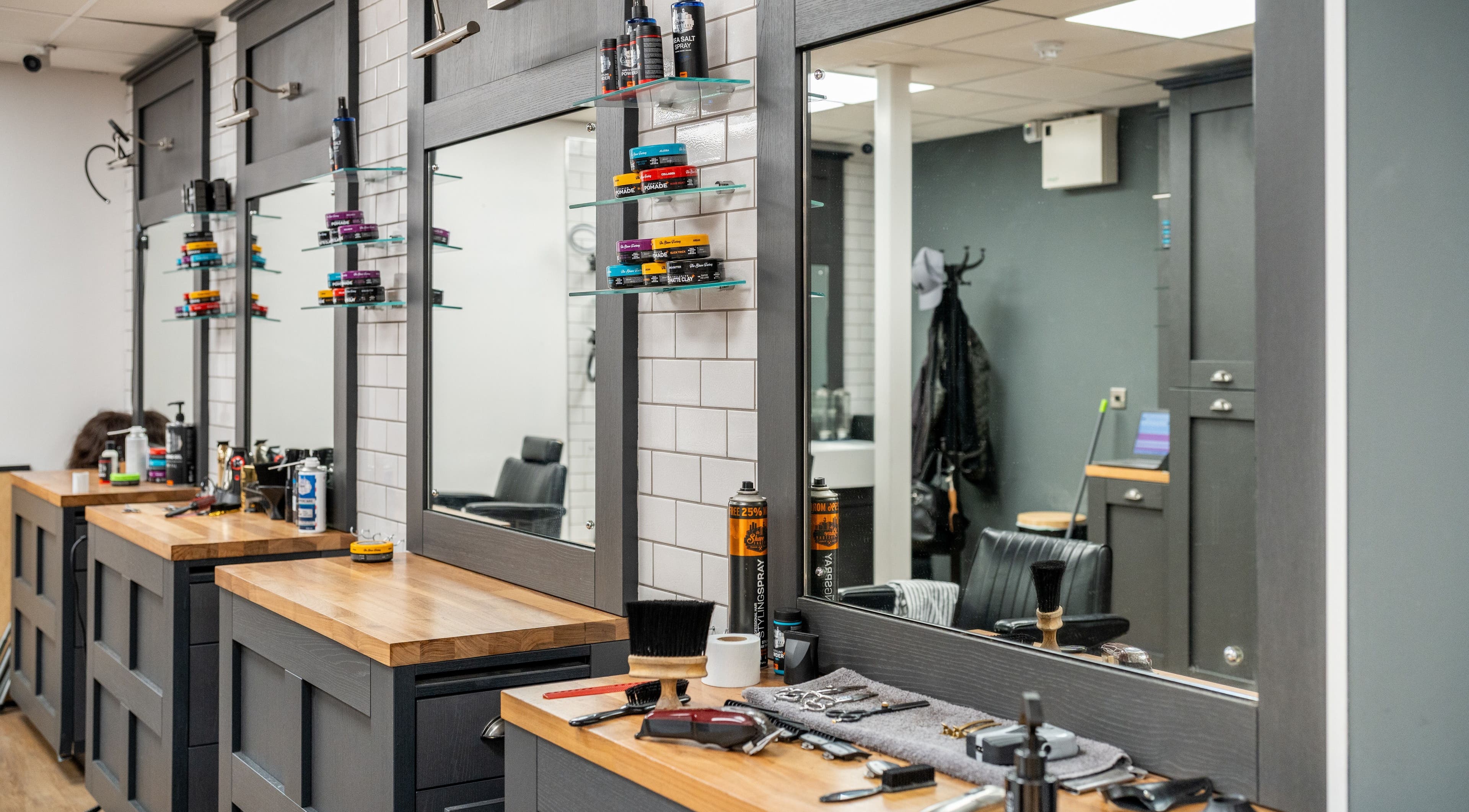 Gould Barbers Cheshunt styling stations with tools in Cheshunt, England, GB.