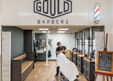 Gould Barbers Cheshunt interior showcasing a stylish haircut session in Cheshunt, England, GB.