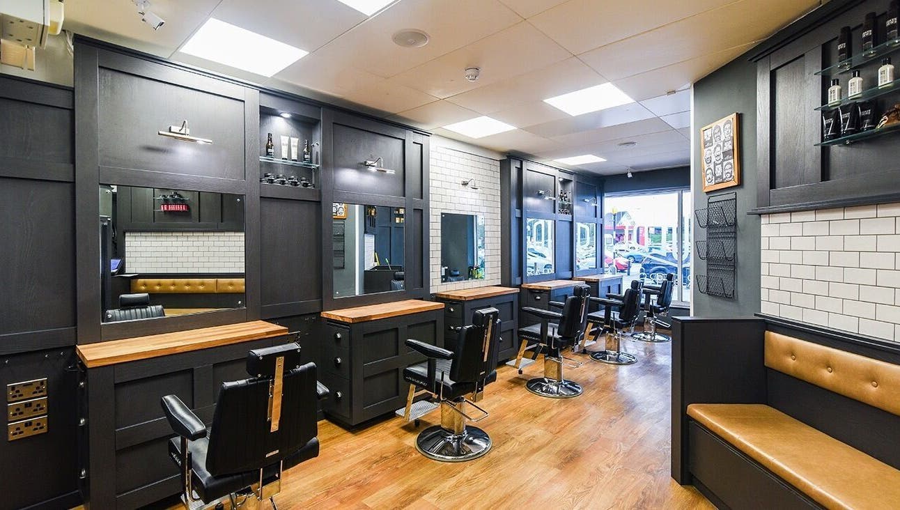 Interior of Gould Barbers Ipswich in Ipswich, England, GB featuring modern barber chairs and sleek design.