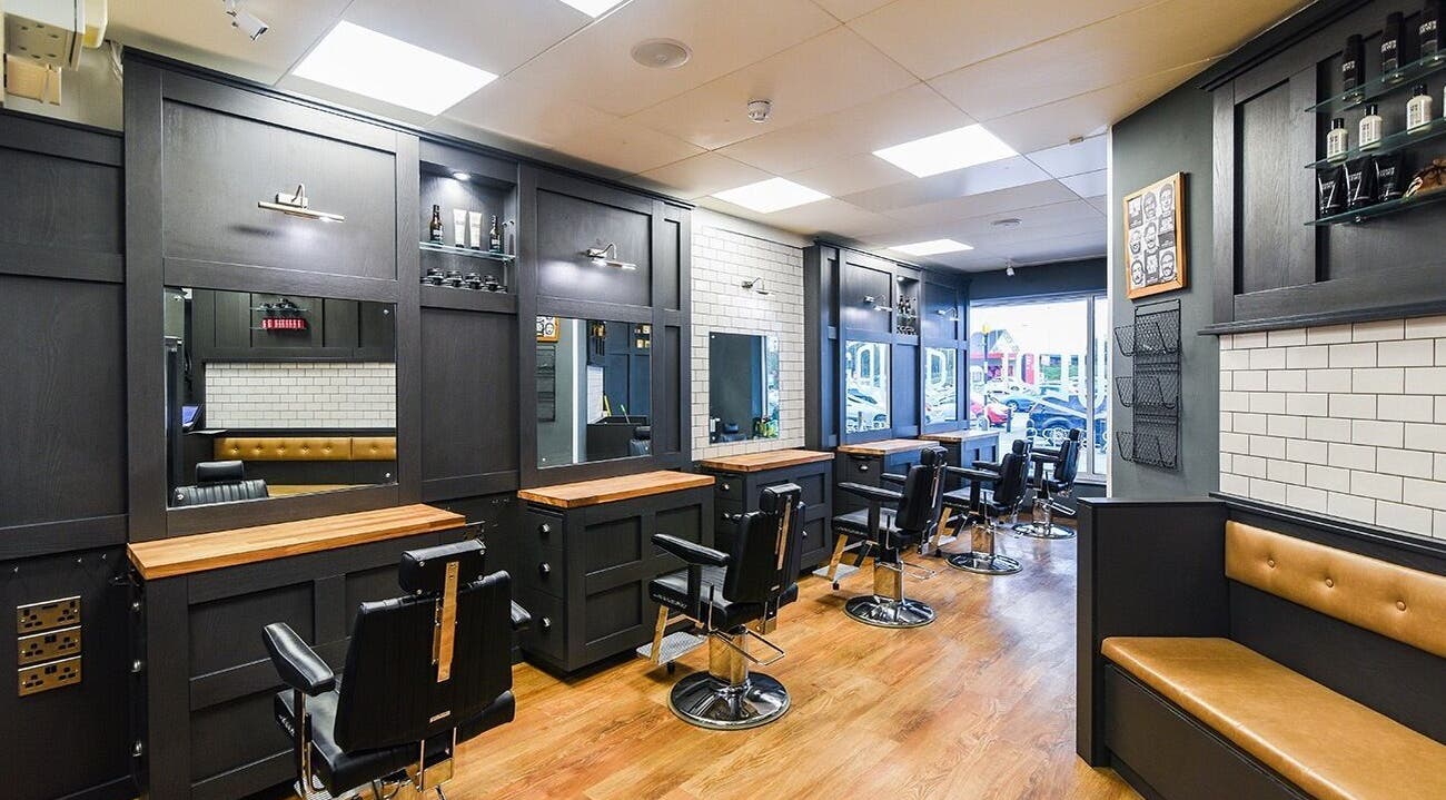 Interior of Gould Barbers Ipswich in Ipswich, England, GB featuring modern barber chairs and sleek design.