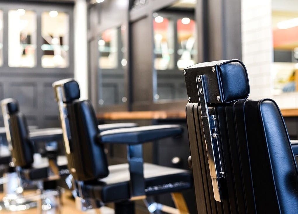 Modern barber chairs at Gould Barbers Ipswich, Ipswich, England, GB, reflecting sleek design and comfort.