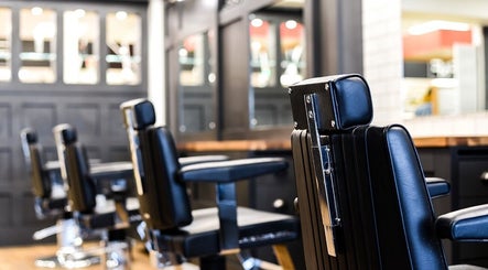 Modern barber chairs at Gould Barbers Ipswich, Ipswich, England, GB, reflecting sleek design and comfort.