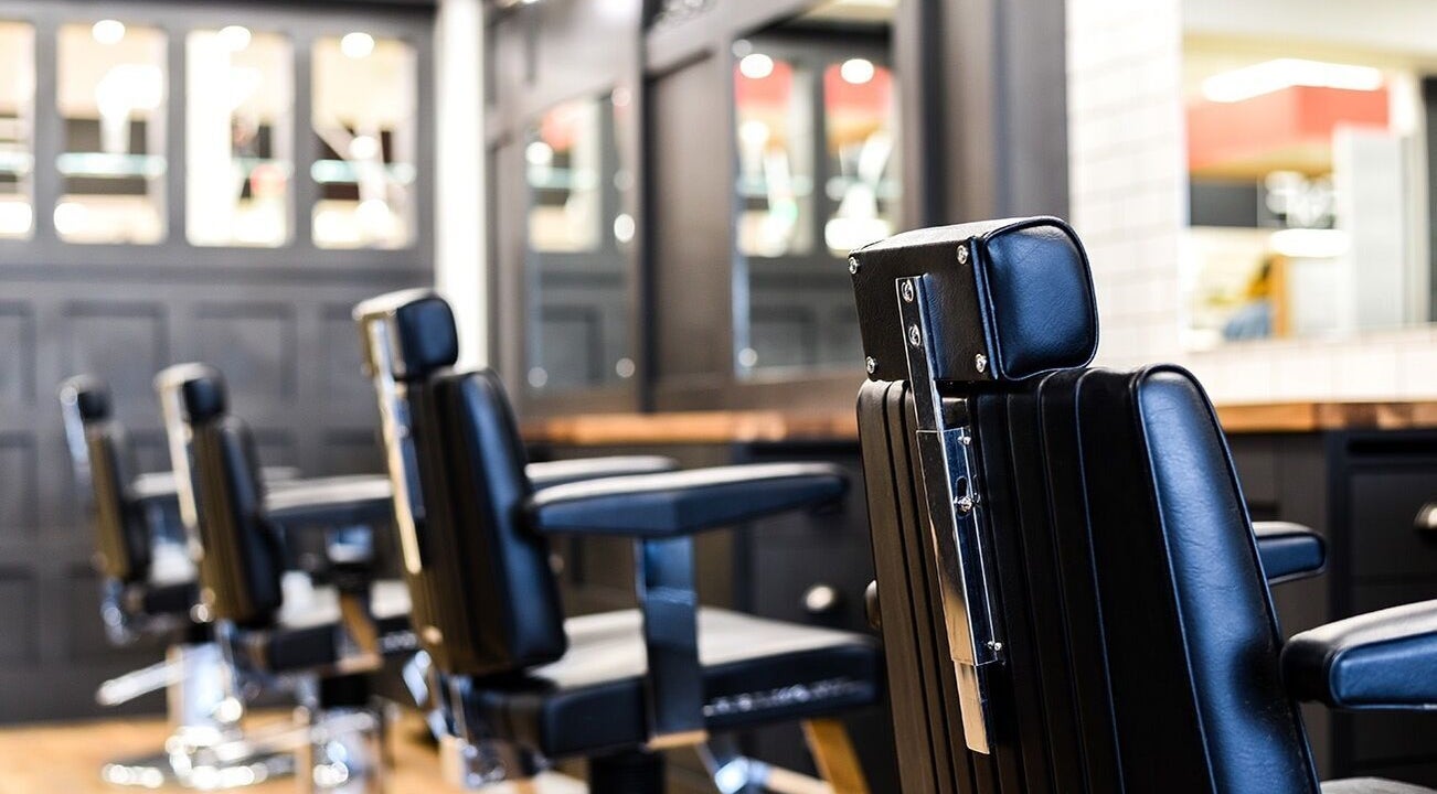Modern barber chairs at Gould Barbers Ipswich, Ipswich, England, GB, reflecting sleek design and comfort.