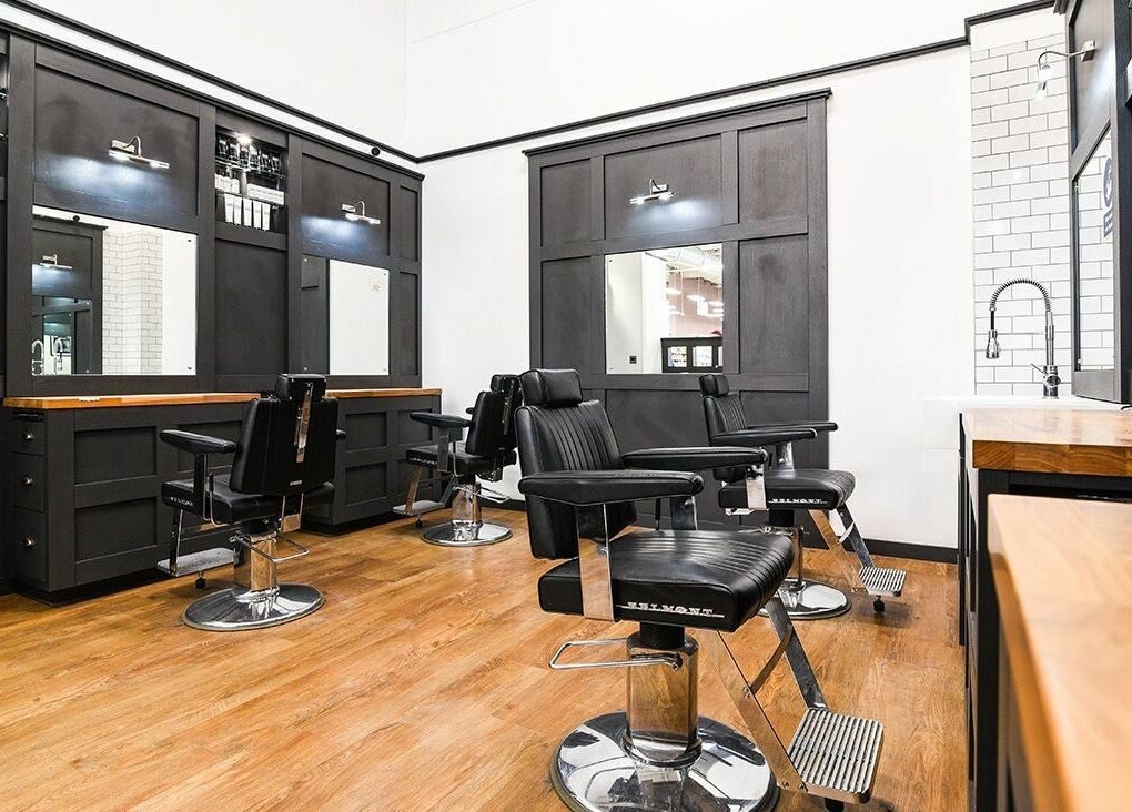 Modern barber chairs and sleek decor at Gould Barbers Walsall, located in Walsall, England, GB.