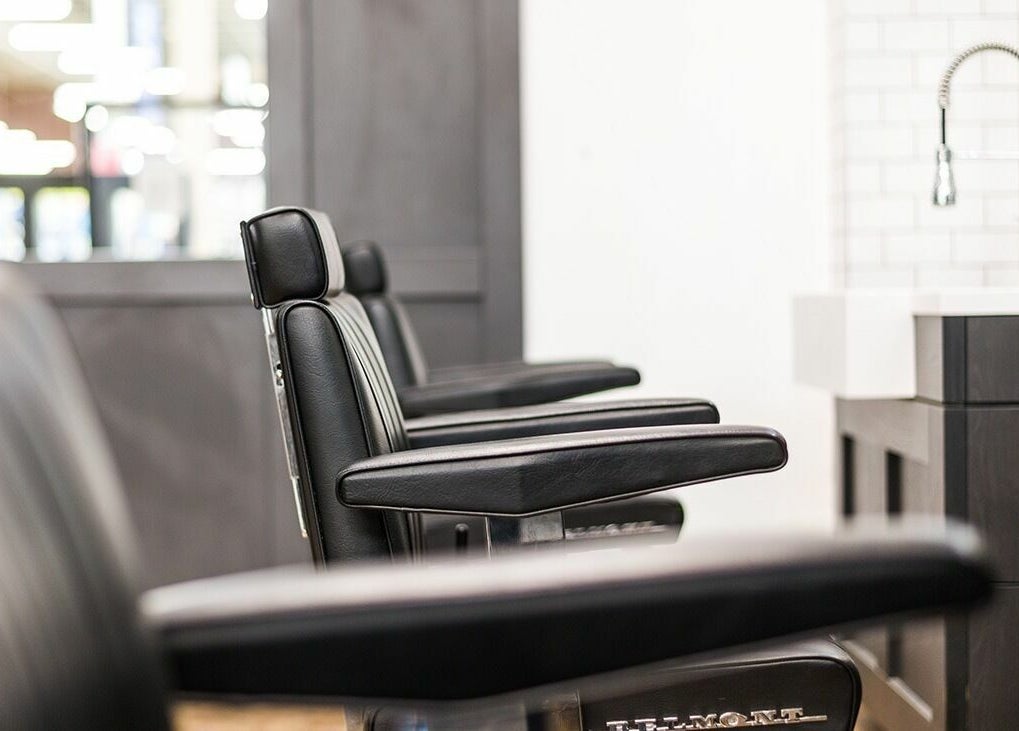 Sleek barber chairs at Gould Barbers Walsall, Walsall, England, GB offering a modern grooming experience.
