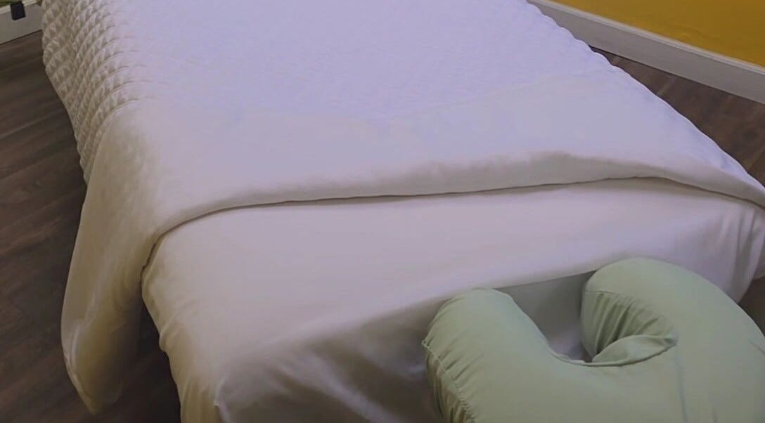 Massage bed at The Healing Sunflower Massage and Wellness - Elmhurst, providing relaxation in Elmhurst, Illinois, US.