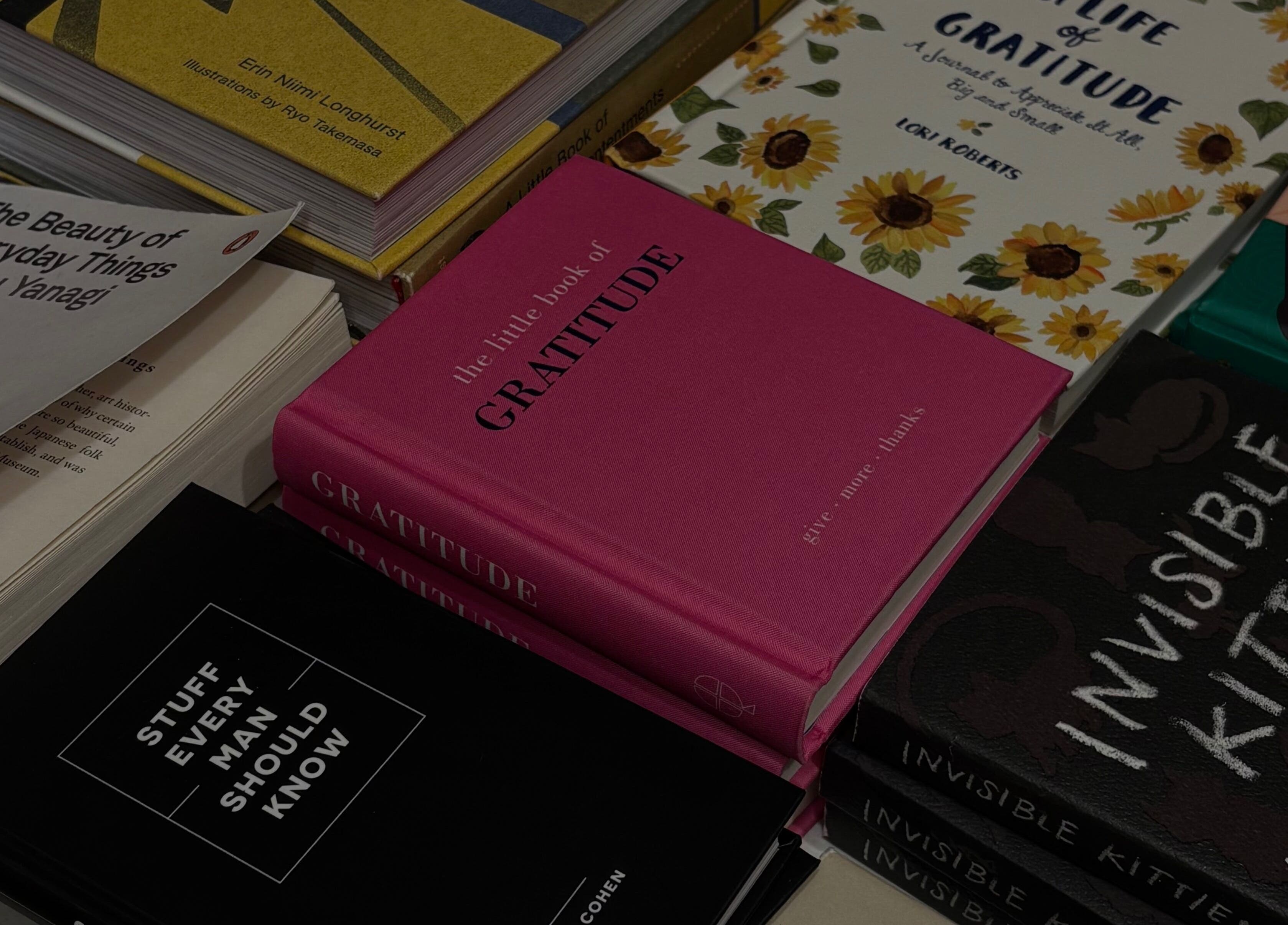 Books on gratitude and personal growth at LAU, Toronto, Ontario, CA beauty and wellness marketplace.