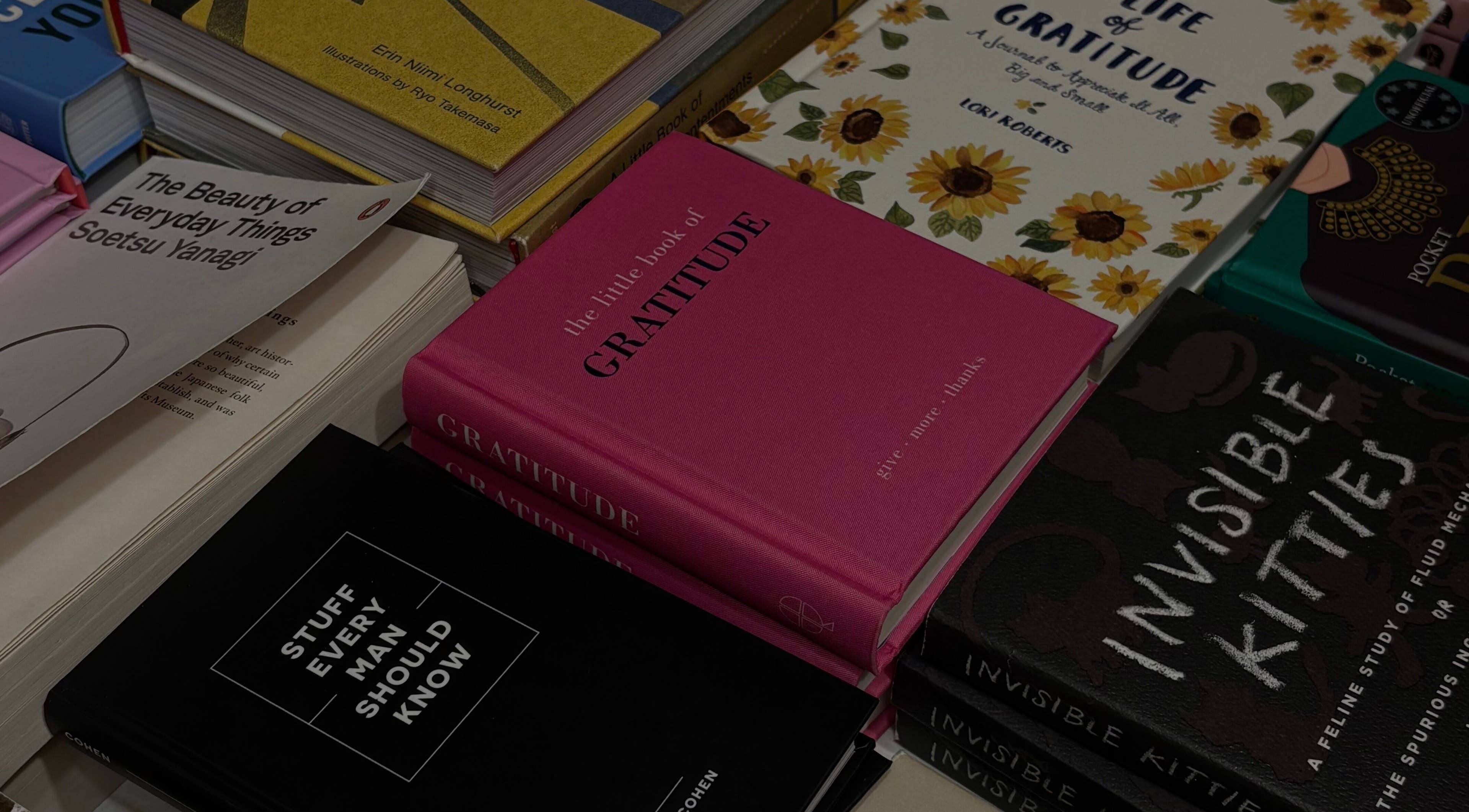 Books on gratitude and personal growth at LAU, Toronto, Ontario, CA beauty and wellness marketplace.