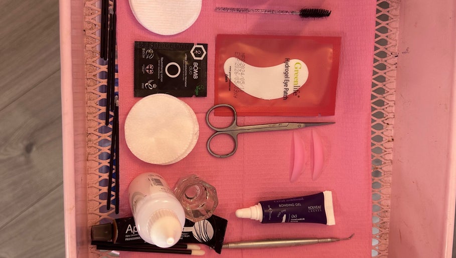 EffortlessBeauty_SLJ - Mobile Only eyelash tools and products displayed on pink tray in Telford, England, GB.