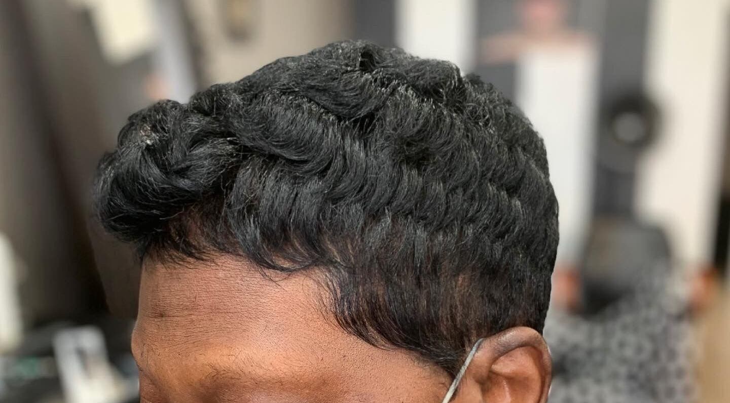 Elegant hairstyle with waves at Jay Fields - PhenomHair, Forney, Texas, US.