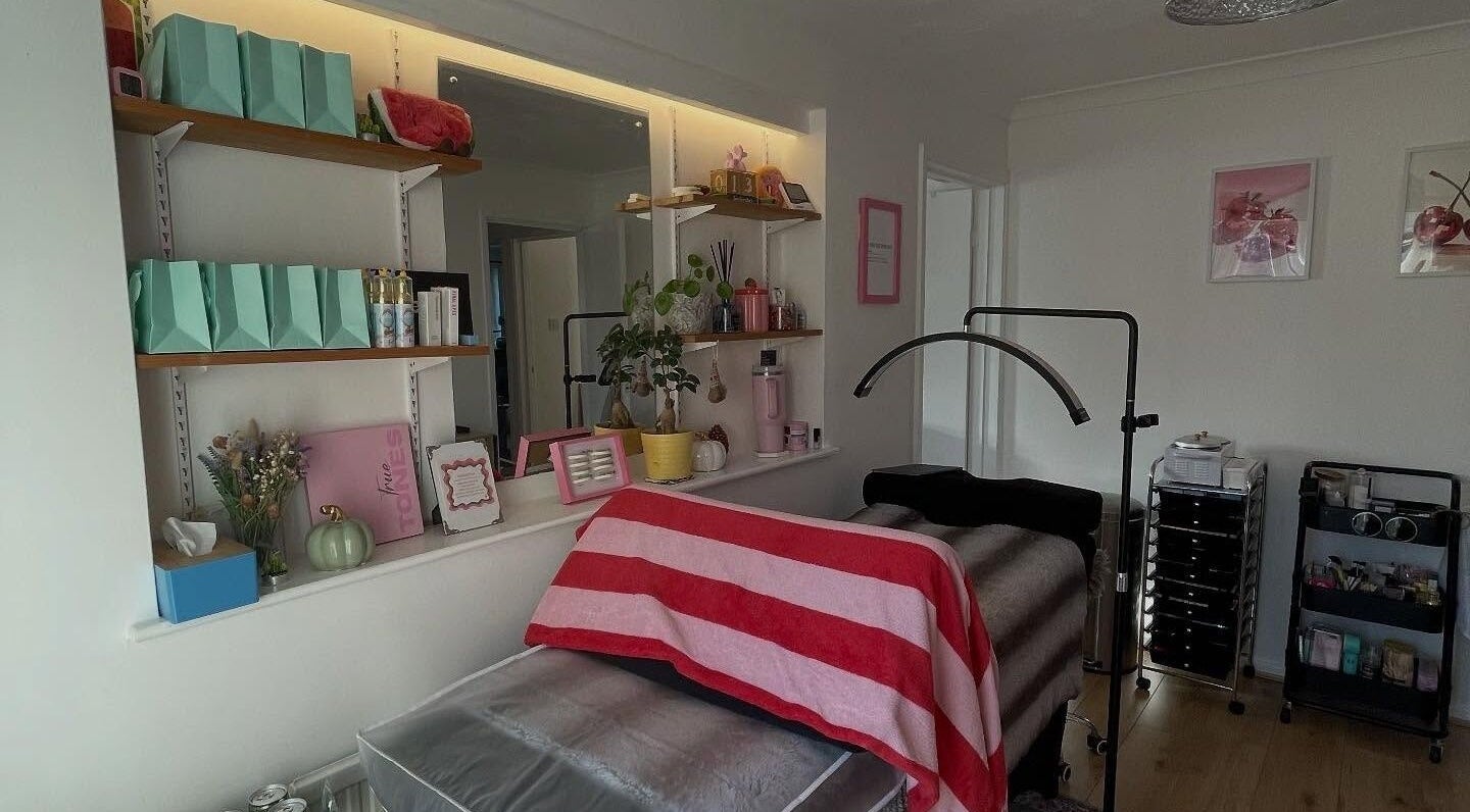 Cozy treatment room at Watermelon Beauty, Bawdeswell, England, GB with stylish decor and beauty essentials.