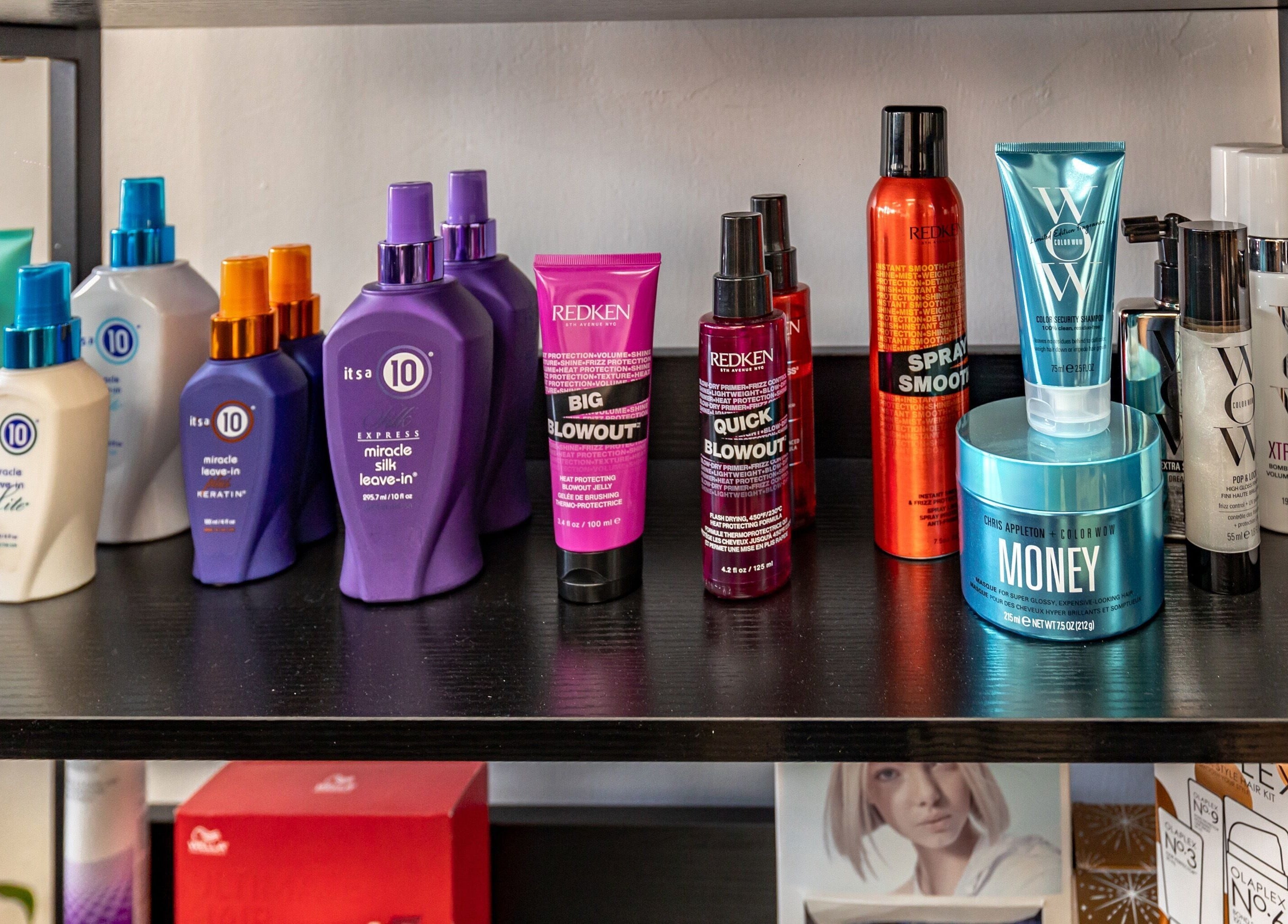 Premium hair products on display at A&A Hairloft, Mineola, New York, US, showcasing styling excellence.