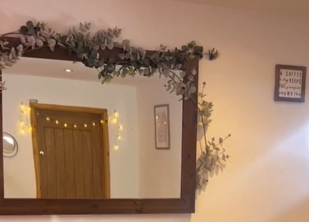 Elegant wooden mirror with lights at All About You in Wrexham Principal Area, Wales, GB.