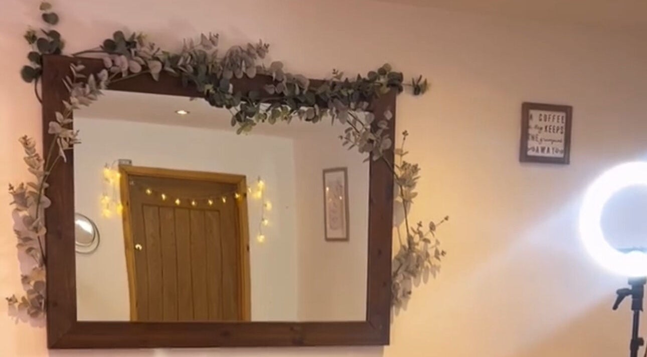 Elegant wooden mirror with lights at All About You in Wrexham Principal Area, Wales, GB.