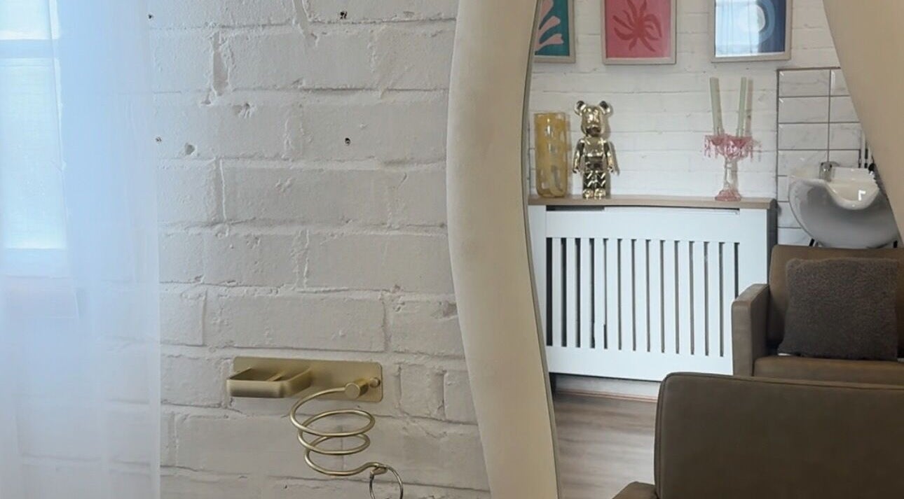 Chic beauty area in Saturate The Studio, Johnston, Wales, GB with stylish decor and comfortable seating.