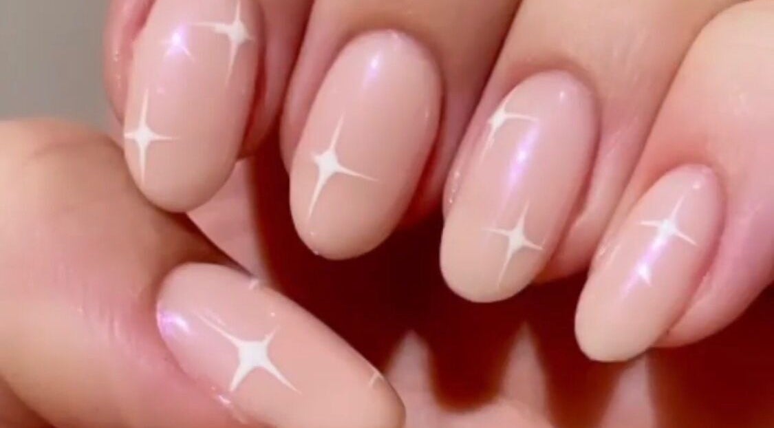 Elegant sparkling manicure from Nailed You By Lou in Stockport, England, GB. Perfectly polished nails.