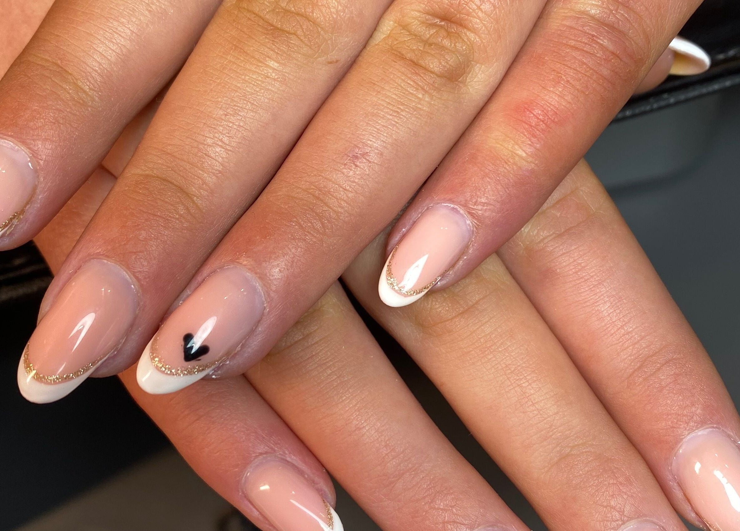 Stylish nail design with gold accents at Nailed You By Lou, Stockport, England, GB.
