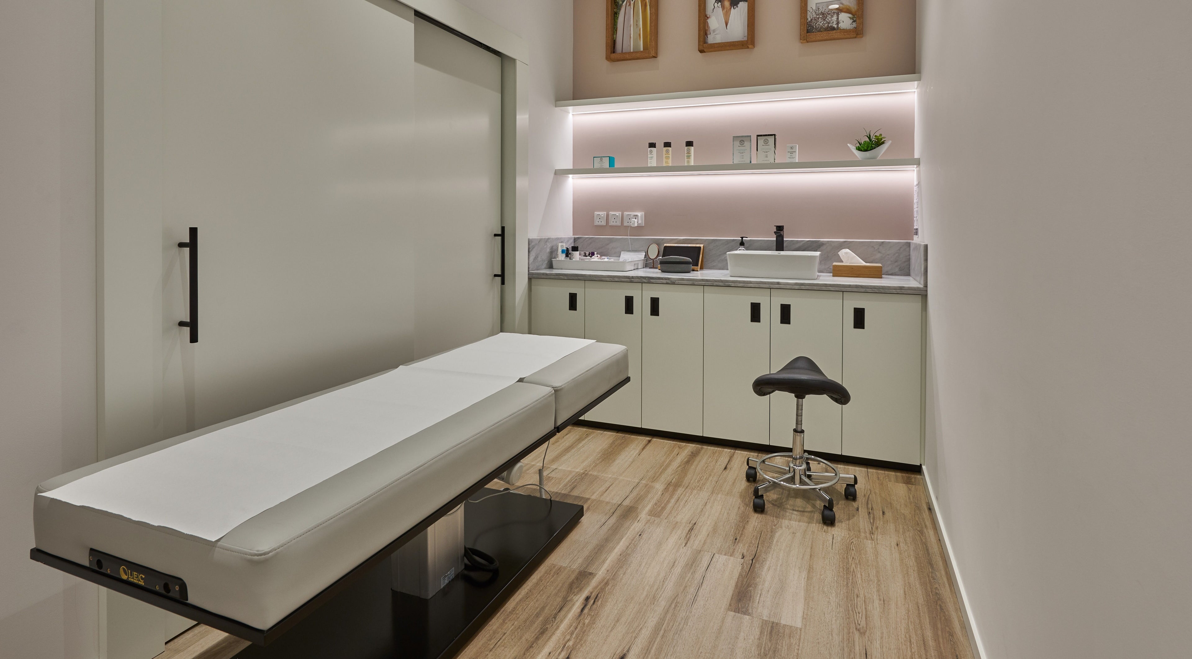 Calming treatment room at Skin Laundry - Marina, Dubai, Dubai, AE with modern decor and soothing ambiance.